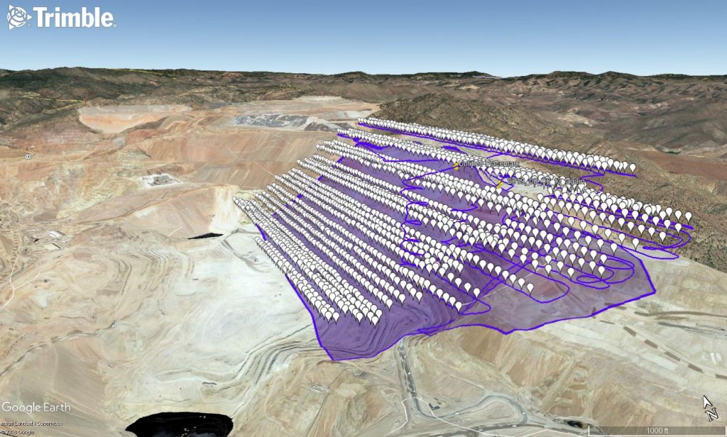 Open-pit mine wall with an overlay showing the image capture area flown by the senseFly eBee X fixed-wing drone.